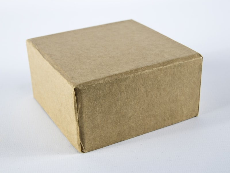 A sealed and taped StrongBox carton with its QR label on the side