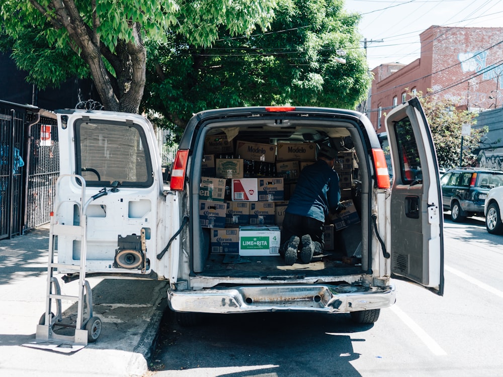 A StrongBox van parked outside a Cape Town home with the rear doors open and boxes being loaded